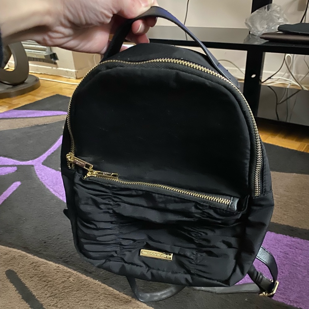 Madden girl black mini knapsack like new